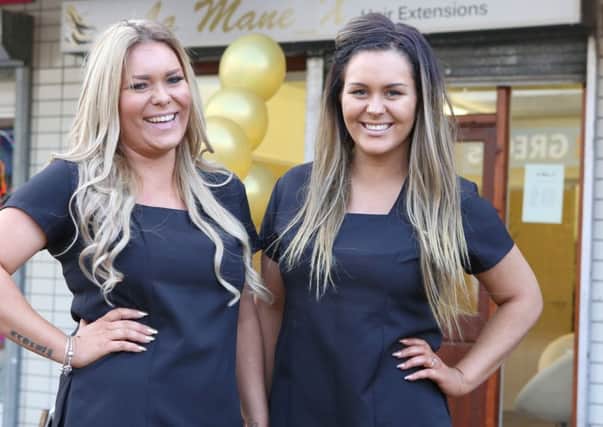 Kaz and Lauren Griffin outside their new business