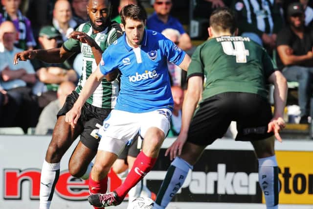 Danny Hollands in play-off action for Pompey against Plymouth last season