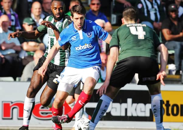 Danny Hollands in play-off action for Pompey against Plymouth last season
