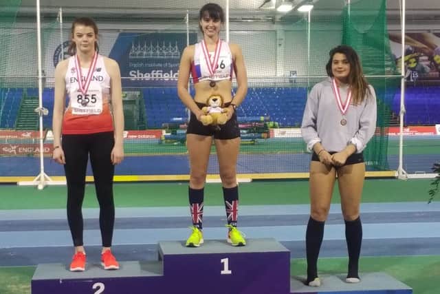 Serena Vincent, centre, celebrates success at the England Athletics Indoor Championships