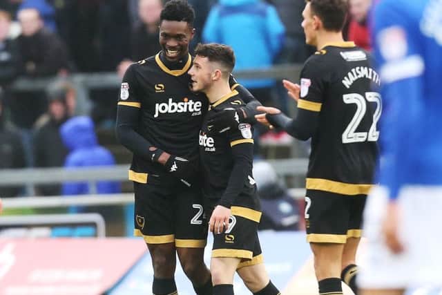 Amine Linganzi celebrates his goal against Carlisle with Conor Chaplin Picture: Joe Pepler