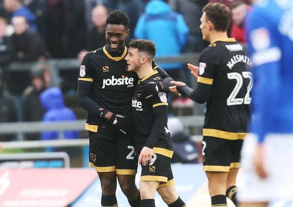 Amine Linganzi celebrates his goal against Carlisle with Conor Chaplin Picture: Joe Pepler
