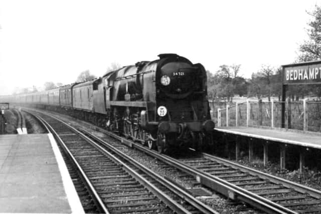 STEAM On April 25, 1965 a diverted boat train from Southampton Docks roars through Bedhampton en route to Waterloo 					          Picture: E Wilshurst