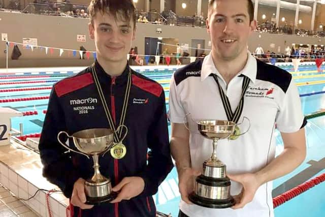 JPNS-06-03-17-015 Fare and Gosp eds swimmers trophiesFrom left, Matt Sullivan and John Molyneaux, who won junior and top trophies in the 50m backstroke.CAPTION: Matt Sullivan, left, and John Molyneaux with their trophies oxfM7QPGCOocna9mWYbz