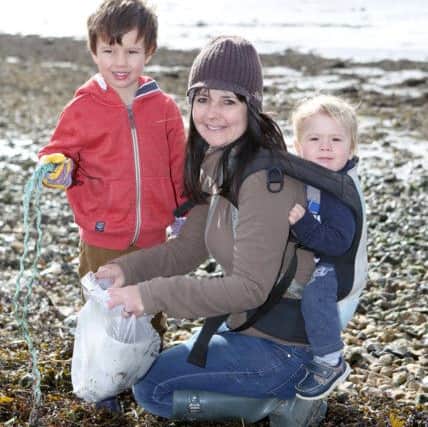 Albert Brown, four, with his mum, Dawn and brother Freddie, one, at Porchester