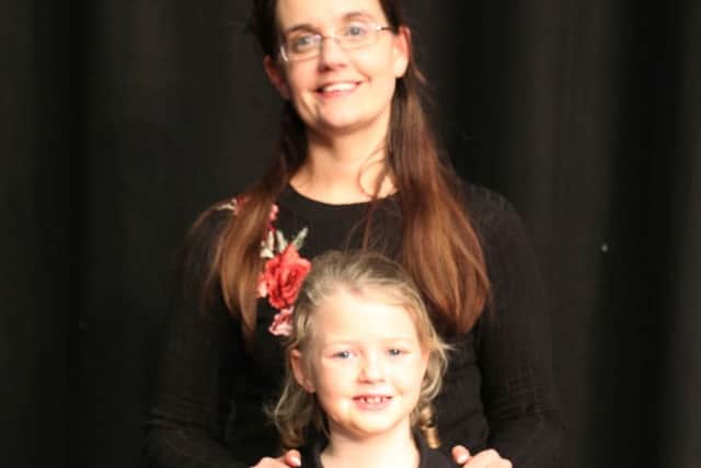 Julia and her daughter Paige, who both won the Sally Noble Bible Reading trophy