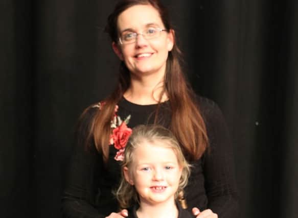 Julia and her daughter Paige, who both won the Sally Noble Bible Reading trophy