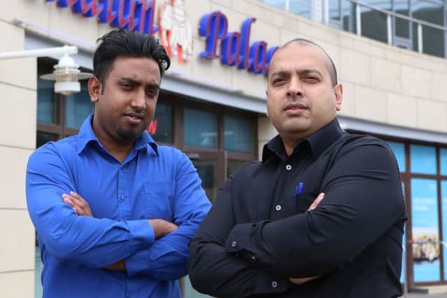 Indian Palace staff Bodrul Choudhury and manager Anwar Miah Picture: Habibur Rahman