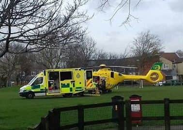 The air ambulance lands near Sultan Road. Credit: John Hook.