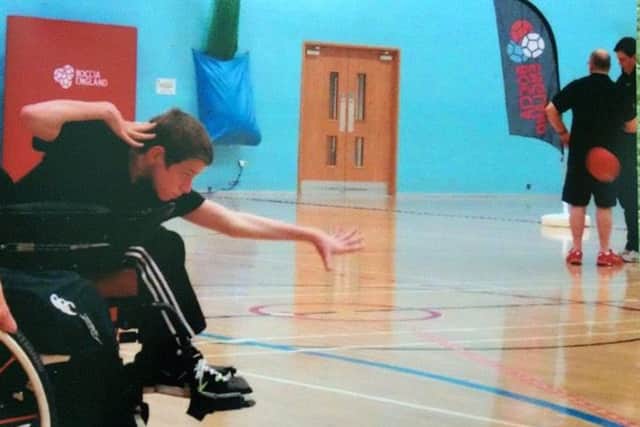 Jasper playing a round of boccia