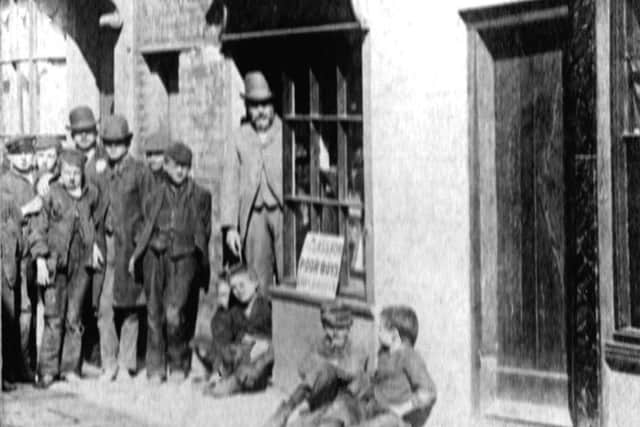 oor boys outside John Pounds workshop in St Marys Street, Old Portsmouth. Picture kindly loaned from Barry Coxs collection