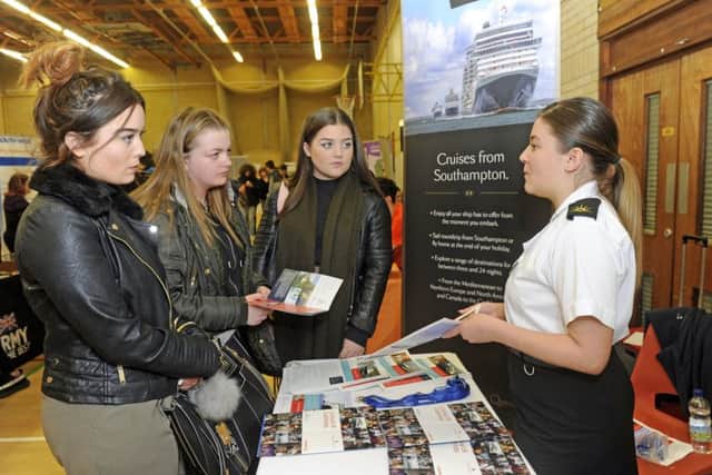 From left, students Sophie Betteridge, 18, Daisy-Mae Smith, 17, and Amy Dalton, 16, talk to Megan Ramsey of Carnival Picture: Ian Hargreaves (170317-1)