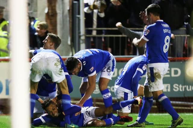 Kyle Bennett celebrates after scoring Pompey's second goal. Picture: Joe Pepler