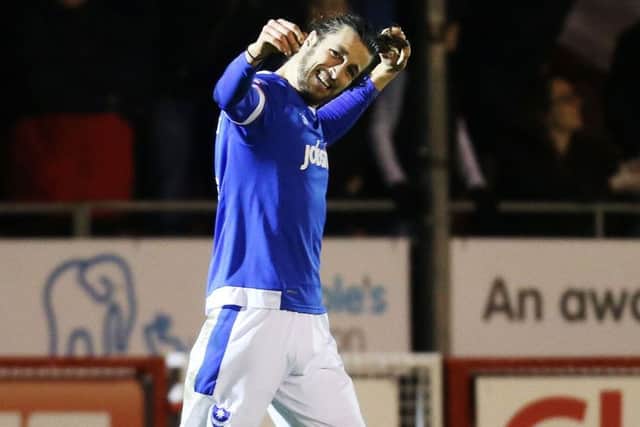 Christian Burgess celebrates his goal. Picture: Joe Pepler