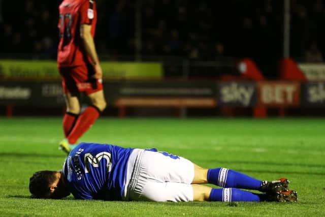 Enda Stevens was injured at Crawley. Picture: Joe Pepler