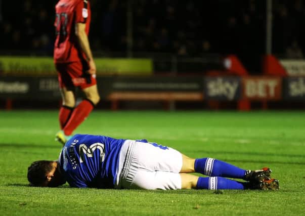 Enda Stevens was injured at Crawley. Picture: Joe Pepler