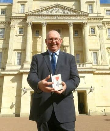 Steve Frampton outside Buckingham Palace after his investiture Picture: Portsmouth College