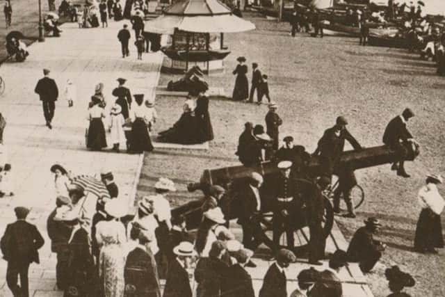 An Edwardian view along Clarence Esplanade. Today, health and safety regulations would have those boys off the cannon. Picture taken from Barry Coxs collection