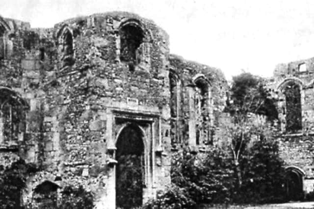 The banqueting hall in Portchester Castle before the removal of shrubbery. Picture taken from Ellis Norrells collection
