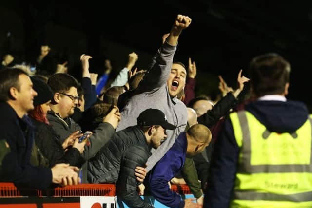 Pompey fans sang their new song at Crawley last night Pic: Joe Pepler