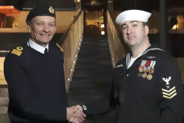 Commodore Al Adams RN and Christopher Ramsey