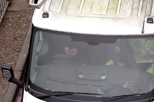 This driver was spotted using his phone at the wheel in Portsmouth on the day that the increased penalties were introduced
