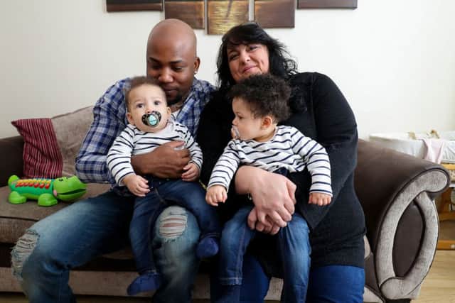 Tracy and Pete Akoun, with their daughters Nyobi, right, and Kenya Picture: Andrew Matthews/PA Wire