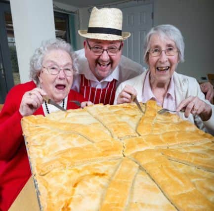 Neil Thompson with residents Pamela Harrison (left) and Pamela Hayer ready to tuck into the pie at Abbeyfield Locks Heath