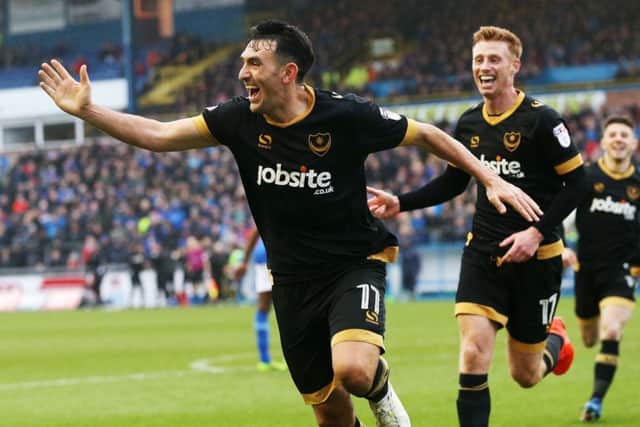 Gary Roberts celebrates his goal at Brunton Park  Picture: Joe Pepler