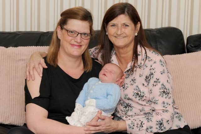 Toni Ford (30) with her son Timmy-Jay Swift and her mum Jackie Griffin (56).Picture: Sarah Standing (170382-8248)
