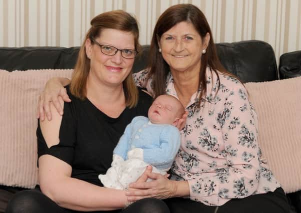 Toni Ford (30) with her son Timmy-Jay Swift and her mum Jackie Griffin (56).

Picture: Sarah Standing (170382-8248)