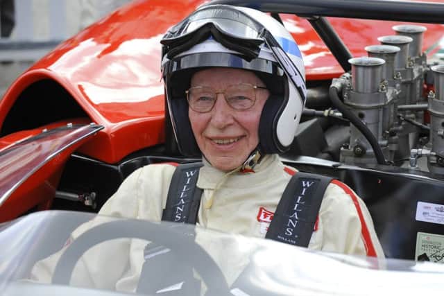 John Surtees prepares to drive a 1967 Lola T70 Spyder at Goodwood Revival in 2014 / Picture: Malcolm Wells (142598-1503)
