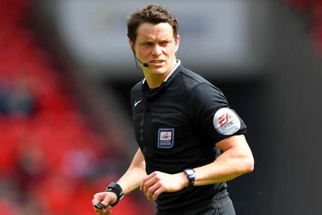 Referee Darren England