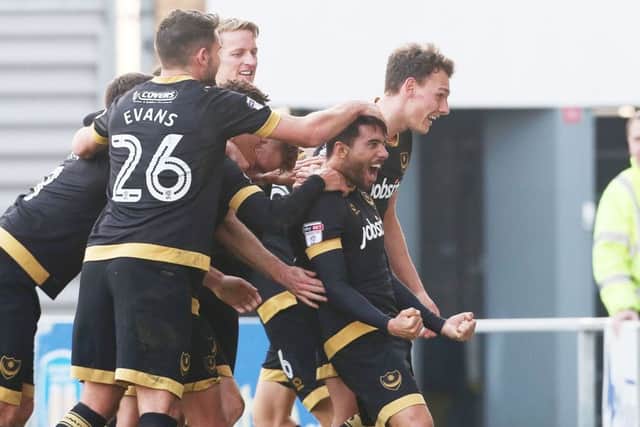 Pompey celebrate Danny Rose's second-half goal Picture: Joe Pepler
