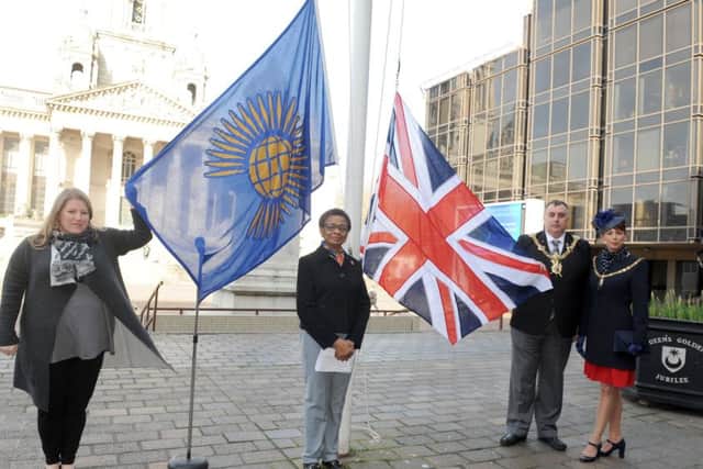 Leader of Portsmouth City Council Donna Jones, Marie Costa and the Lord Mayor and Mayoress of Portsmouth David Fuller and Leza Tremorin at the raising of the Commonwealth flag Picture: Sarah Standing (170383-3897)