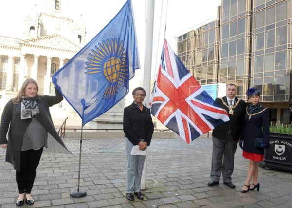 Leader of Portsmouth City Council Donna Jones, Marie Costa and the Lord Mayor and Mayoress of Portsmouth David Fuller and Leza Tremorin at the raising of the Commonwealth flag   Picture: Sarah Standing (170383-3897)