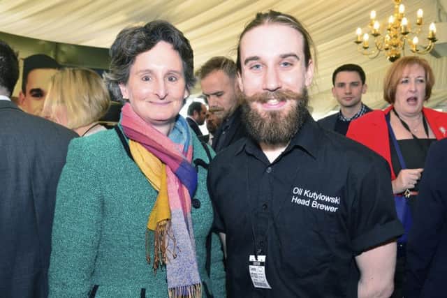 Apprentice Oliver Kutylowski from the Brewhouse & Kitchen and Portsmouth South MP Flick Drummond