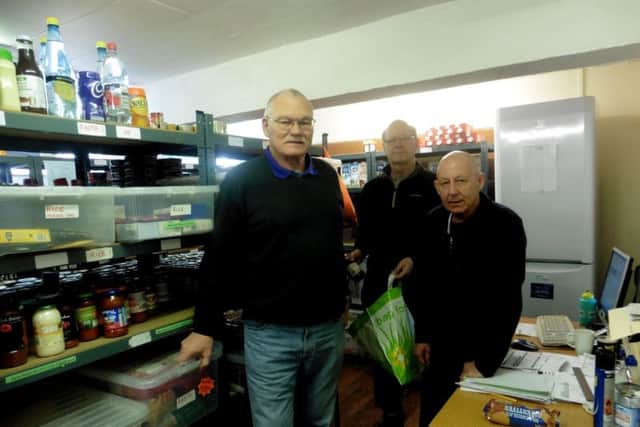 From left, David Randall, Peter Laggon and John Mannion at the Fareham and Gosport Basics Food Bank Picture: Ellie Pilmoor