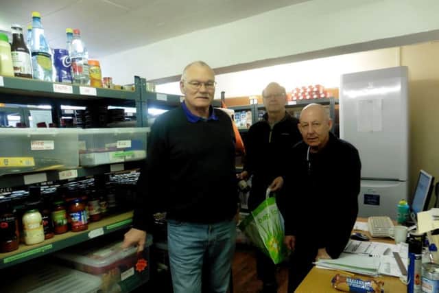 From left, David Randall, Peter Laggon and John Mannion at the 

Fareham and Gosport Basics Food Bank Picture: Ellie Pilmoor