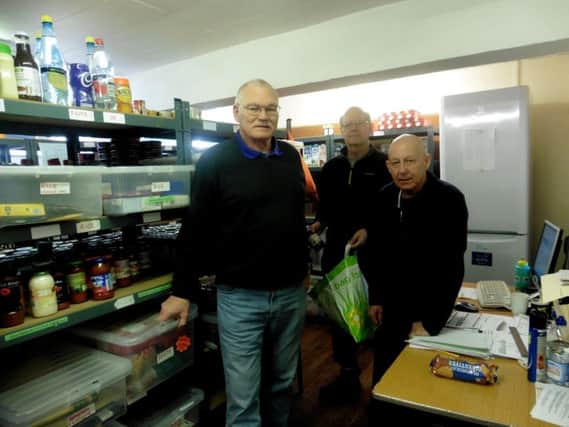 From left, David Randall, Peter Laggon and John Mannion at the 

Fareham and Gosport Basics Food Bank Picture: Ellie Pilmoor