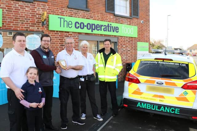 HCFRs group co-ordinator Peter Halkyayd gave Selsmore Road Co-Op manager Adam Casey a thank-you plaque