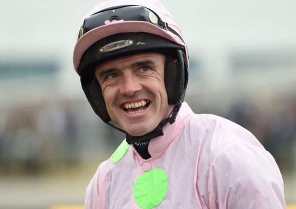 Ruby Walsh will carry the Rich Ricci silkd on Djakadam in the Cheltenham Gold Cup: Andrew Matthews/PA Wire.