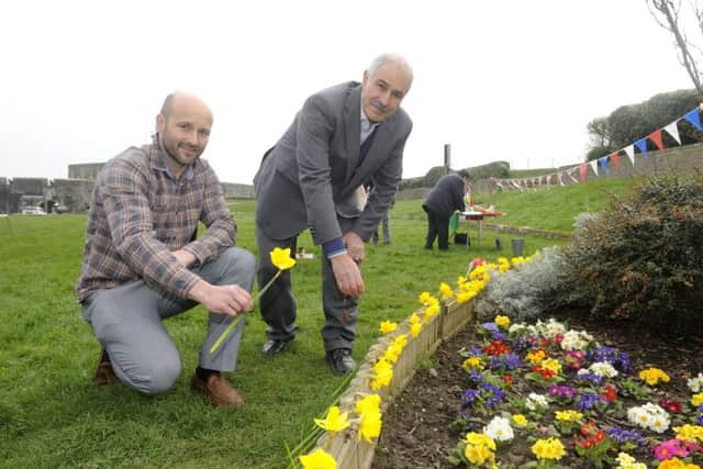 Members of the Kurdish community in Portsmouth held a ceremony to remebered massacred Kurds in 1988. Left is Jon Plater, the father of Ryan Lock who was killed fighting Isis in Syria, attended the ceremony yesterday.