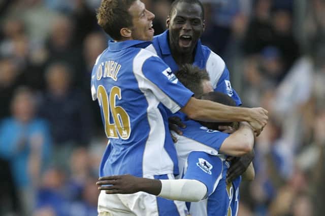 Pompey players Gary ONeil, Djimi Traore, Matt Taylor and Lomana Lualua celebrate after Rio Ferdinands own goal handed the Blues a 2-1 Fratton Park win over Manchester United in 2007