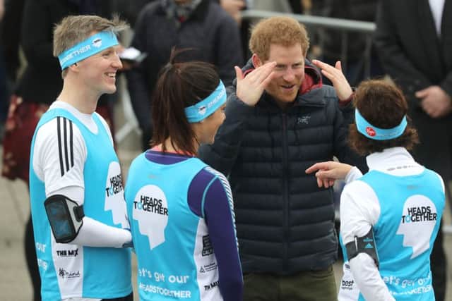 Leane Stevenson, right, meets Prince Harry at the Heads Together London Marathon training day at the Quayside in Gateshead, Newcastle. Picture: Owen Humphreys/PA Wire.