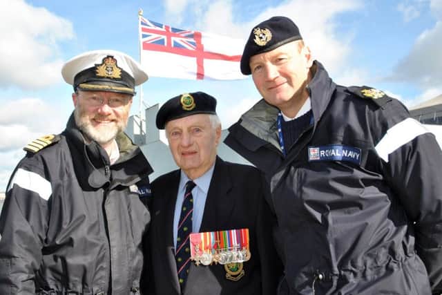 Les Wills on the new Jetty with Capt Iain Greenlees, left, and WO Dave Pottle