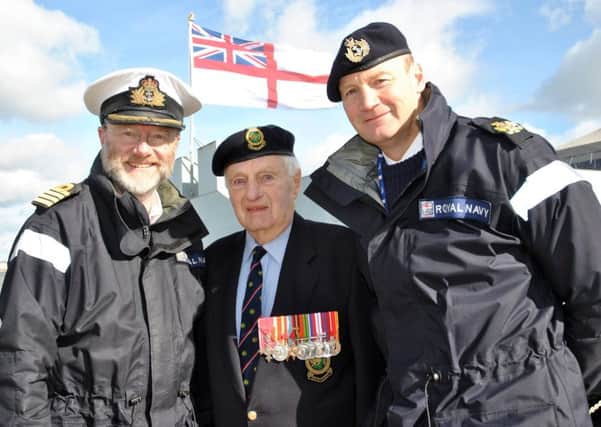 Les Wills on the new Jetty with Capt Iain Greenlees, left, and WO Dave Pottle