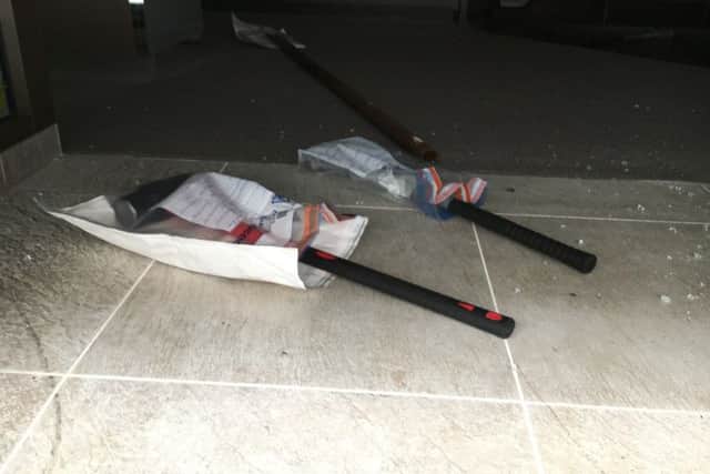 Pictured: Sledgehammers left at Ernest Jones where thieves stole a 'significant' amount of jewellery. Thieves raided Ernest Jones in Cascades Shopping Centre in Portsmouth on July 26. Picture: Ben Fishwick PPP-160726-142135001
