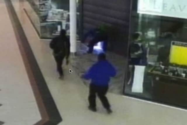 The gang break into the Stoke store. Credit: Staffordshire Police