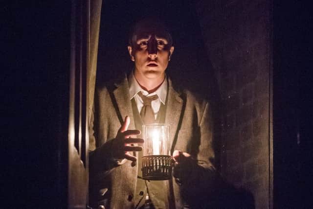 A scene from The Woman In Black. Picture by Tristram Kenton